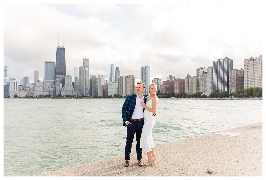 Chicago engagement session at North Avenue Beach with the downtown Chicago skyline along Lake Michigan