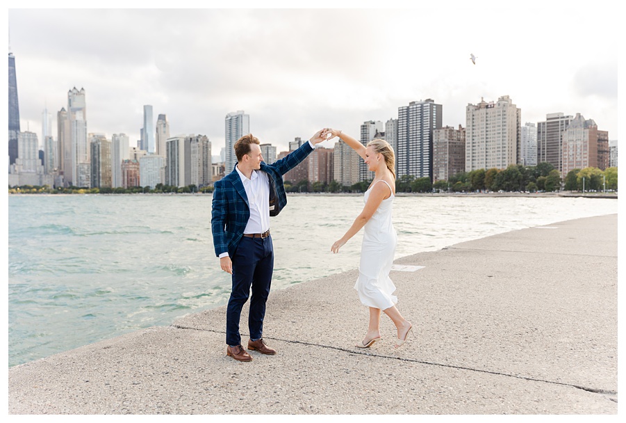 Chicago engagement session at North Avenue Beach with the downtown Chicago skyline along Lake Michigan