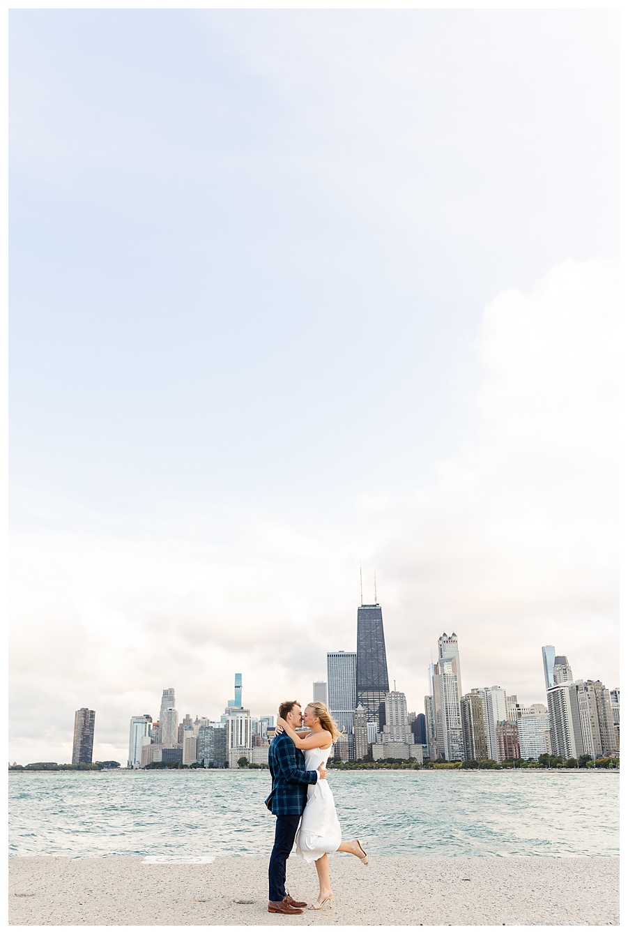 Chicago engagement session at North Avenue Beach with the downtown Chicago skyline along Lake Michigan