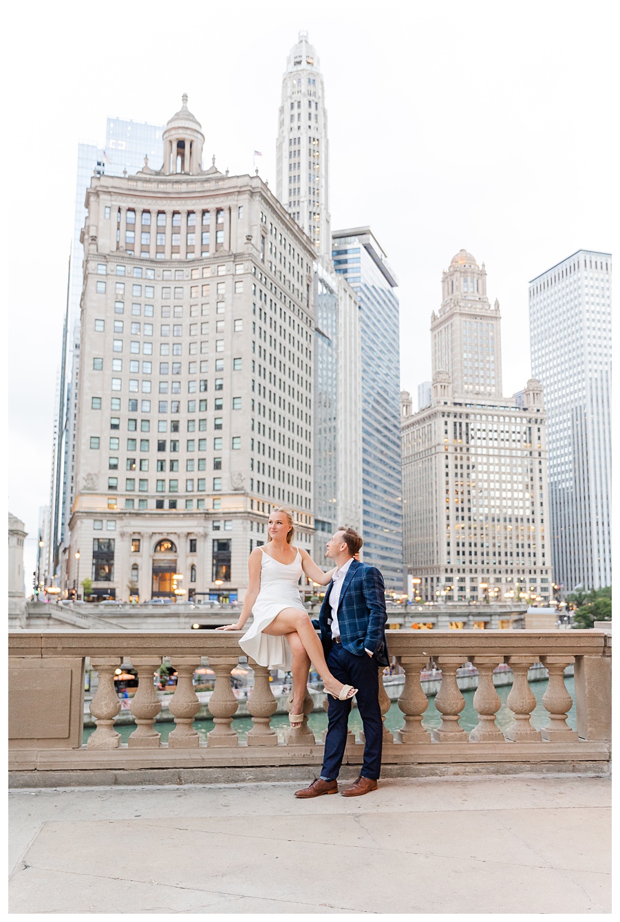 Chicago engagement session  on a bridge with the downtown Chicago skyline, photographed by a St. Louis wedding photographer