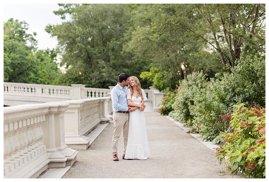 Couple walking in Art Hill during a forest park engagement session in St. Louis, Missouri