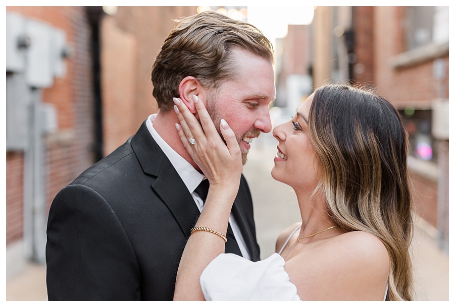 couple embracing during a Tiger Hotel engagement session in Columbia Missouri